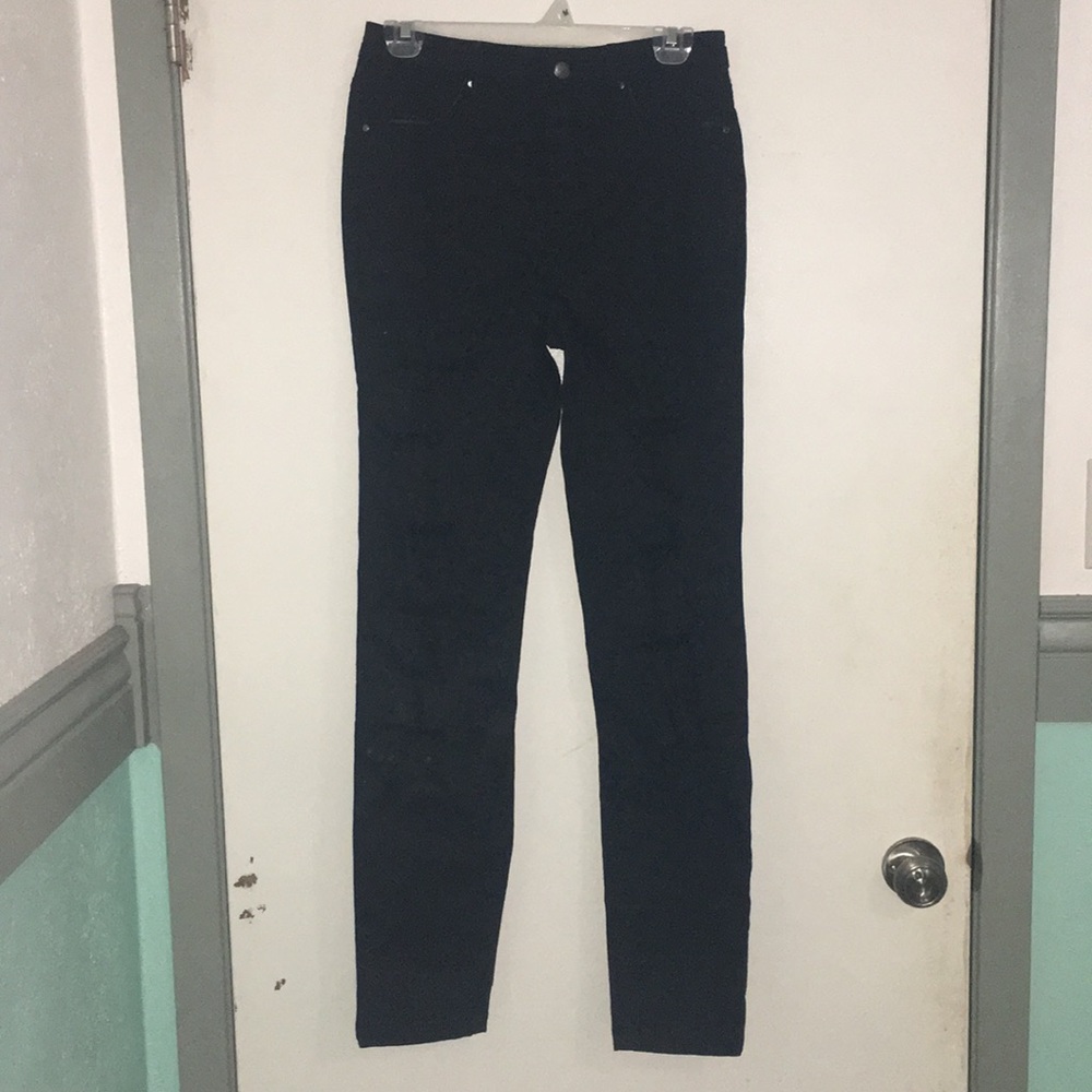 Black dance jeans with linear holes